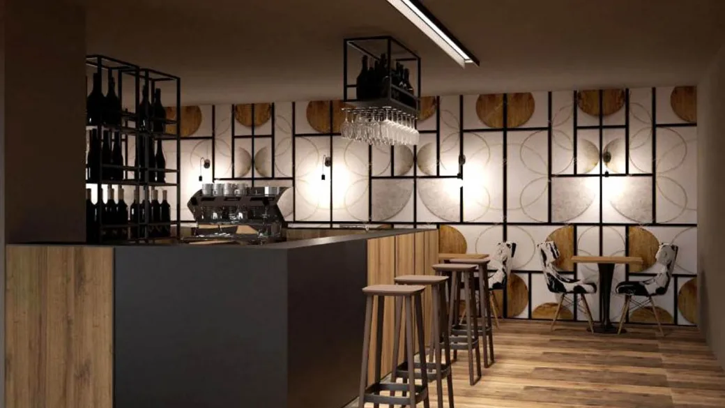 Area bar moderna con bancone in legno e sgabelli alti